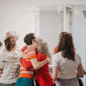 Women Hugging Womens Event 2024