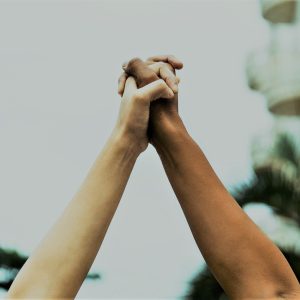 CCJP hands together green tinge