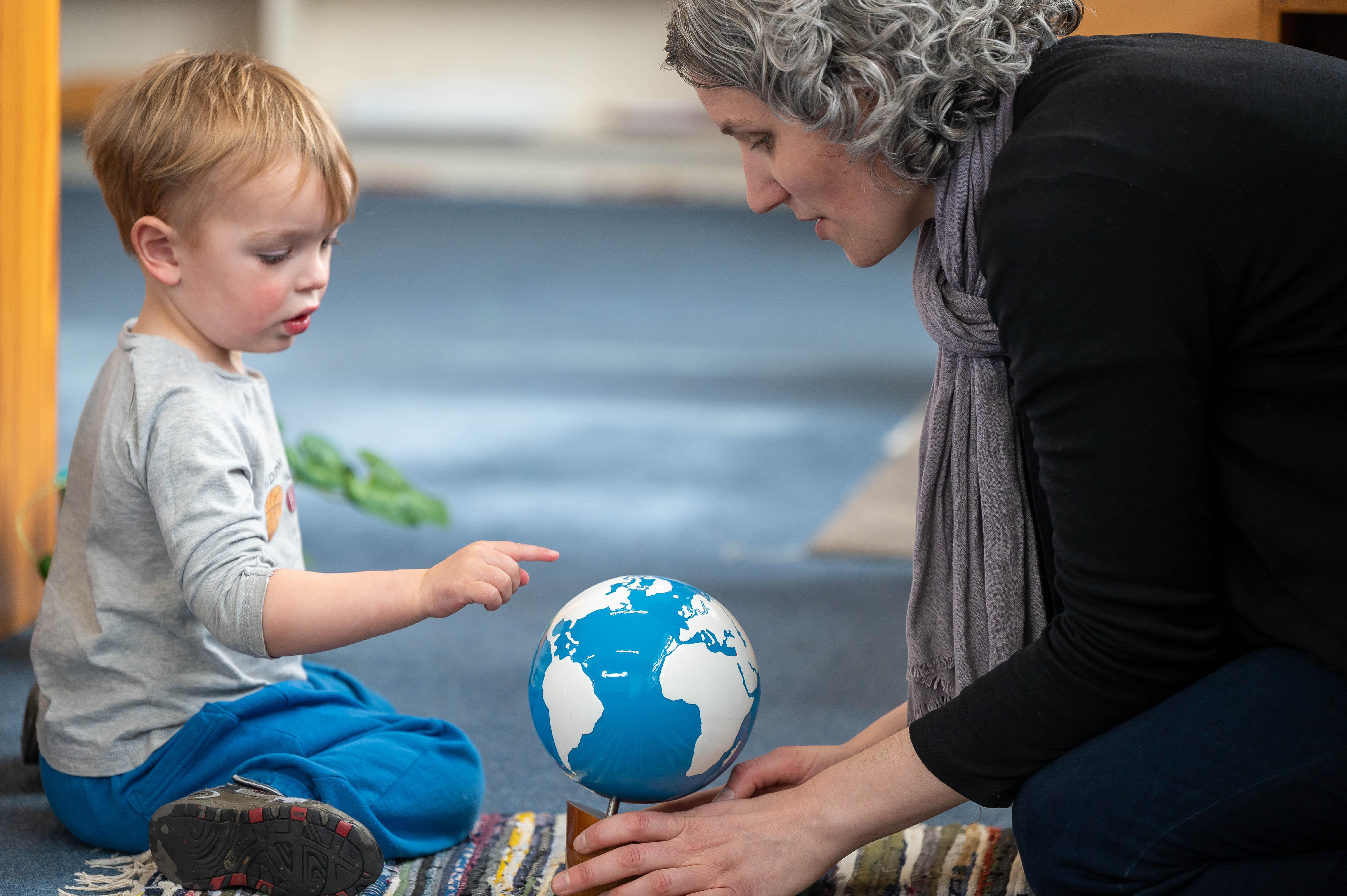 3 year old finding Israel on the Globe