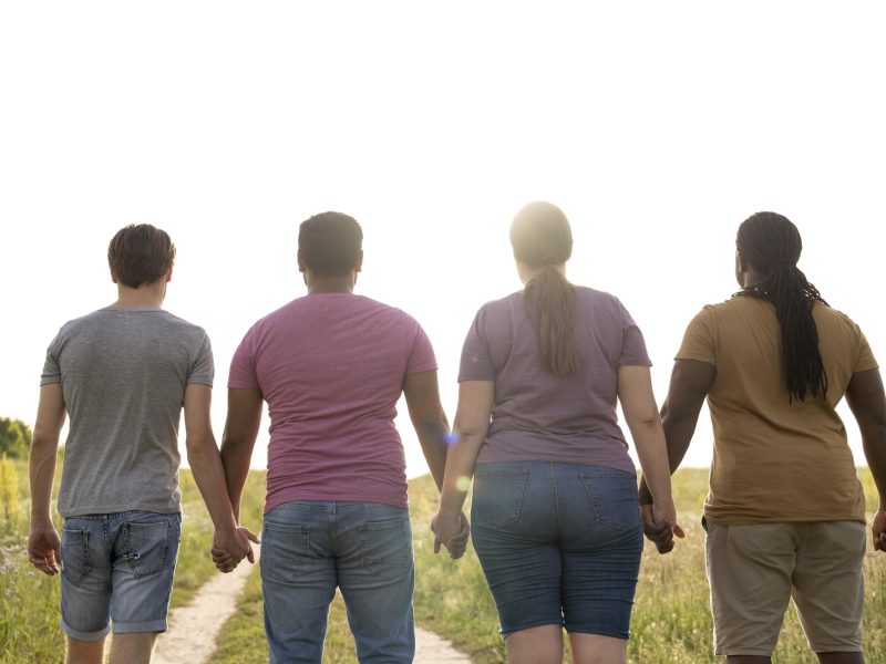 Medium shot people holding hands