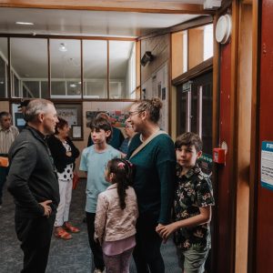 Family with Bishop Michael Te Rangimarie