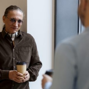 Indigenous man prison men talking chaplain